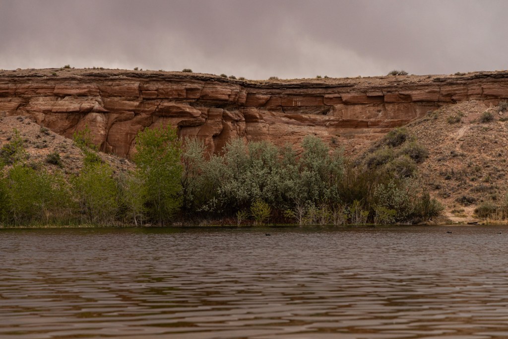 Pasture Canyon Reservoir is a primary water source for Upper and Lower Moenkopi villages south of Tuba City, Ariz. Photo by Christopher Lomahquahu | AZCIR