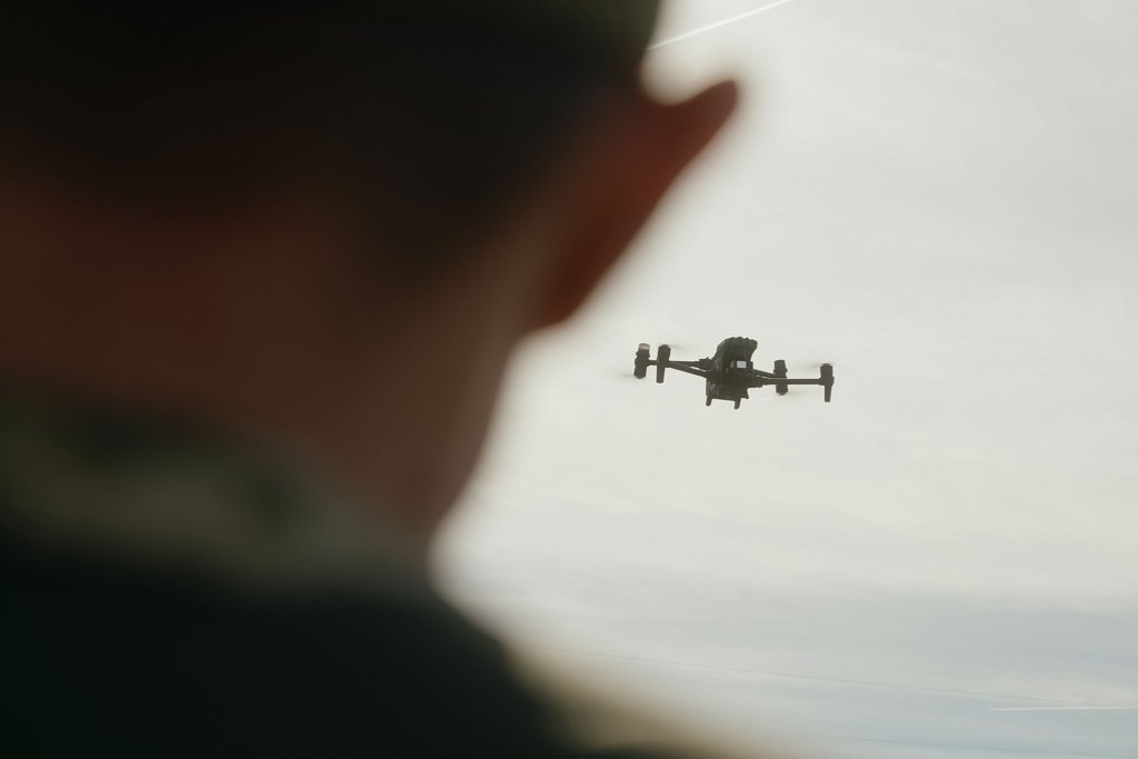 A Ukrainian border patrol guard watches a DJI Matrice 30T Enterprise drone fly along the border with Slovakia on Oct. 13, 2025. Photo by P. Nick Curran | 100 Days in Appalachia